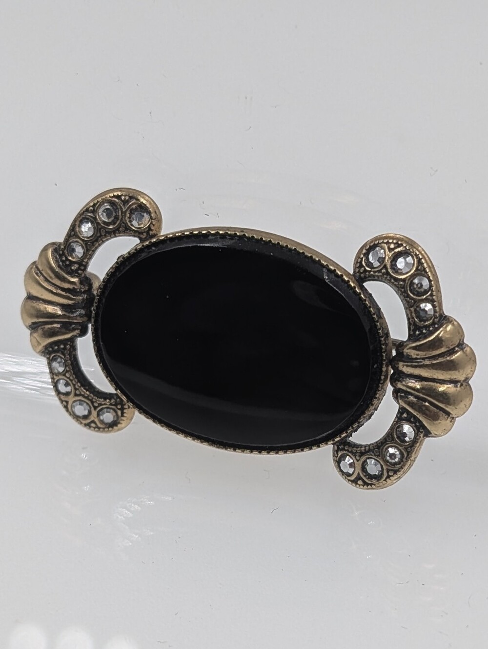 Gold-Tone Black Oval Cabochon Brooch with Crystal Accents C32